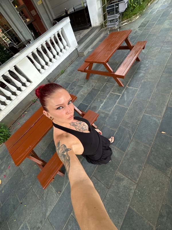 Selfies and river boats on a quiet Hoi An morning