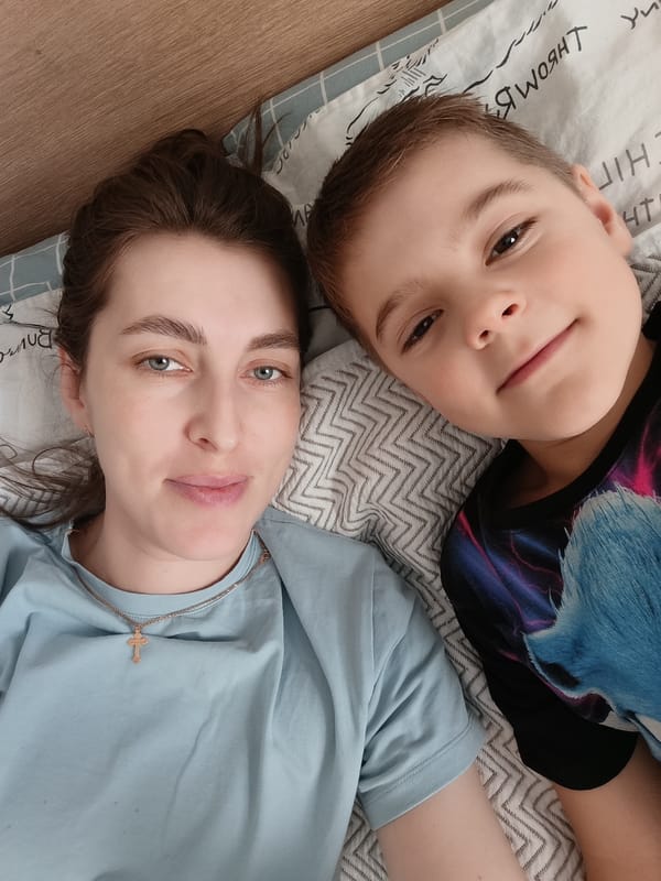 Family spends quiet morning at home with pet cat