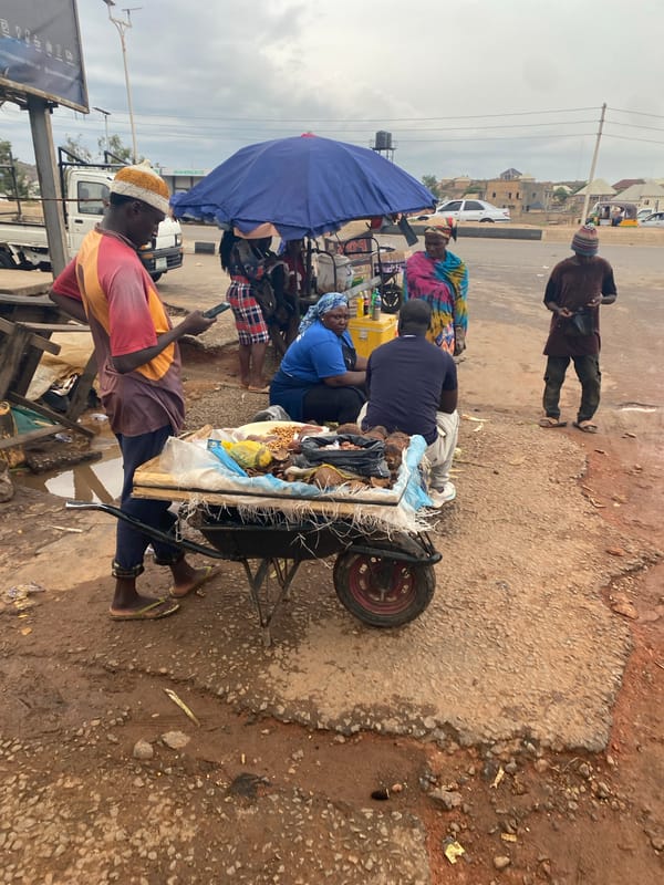 Street vendors and pedestrians captured in Gura Top Nigeria