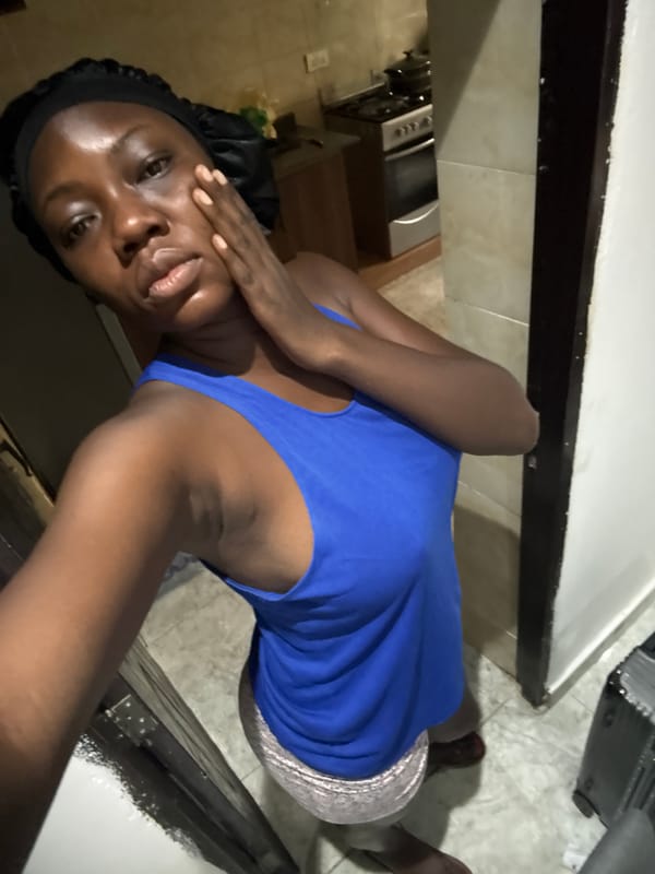 Morning photo session captured woman at home in Nigeria