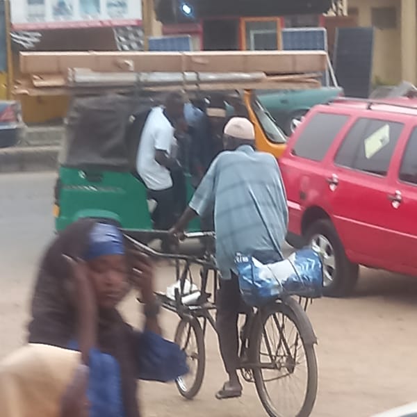 Daily commerce and street life documented in Dadi Riba