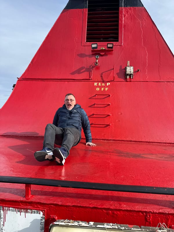 Ferry passengers documented during afternoon coastal journey