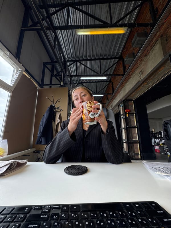 Woman photographed at work, taking selfie in Chaikovsky office