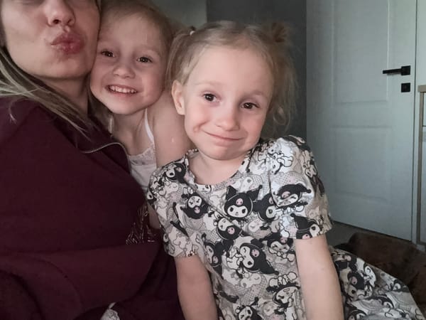 Family moment captured indoors in Krasnoyarsk