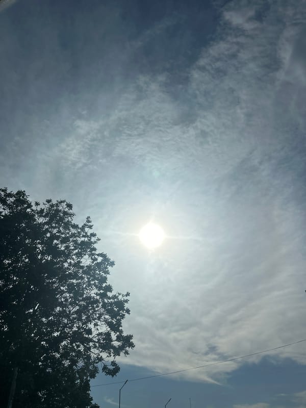 Sunny afternoon sky observed through clouds in Ruse, Bulgaria