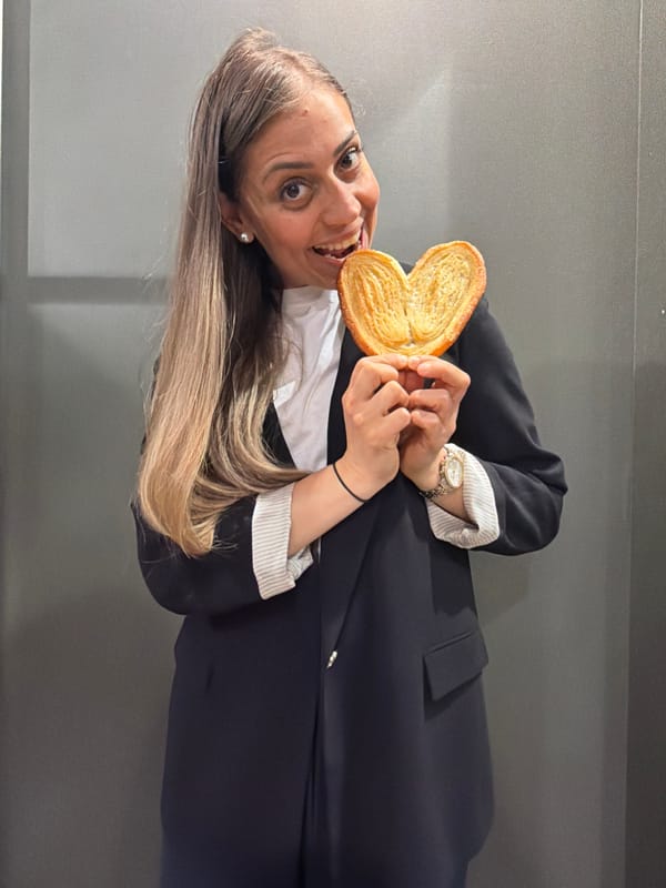 Luxembourg resident documents coffee break with pastry and novelty mug