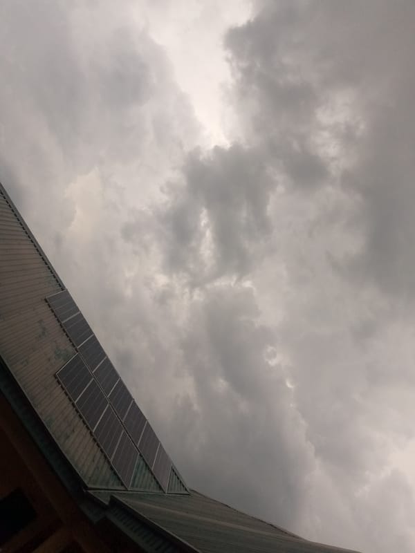 Solar panels and dramatic sunset captured in evening observation