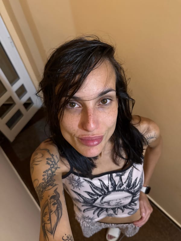 Woman with freckles photographed indoors in Pleven, Bulgaria