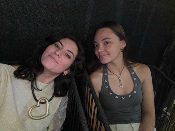 Two women dine and pose together in Mexico