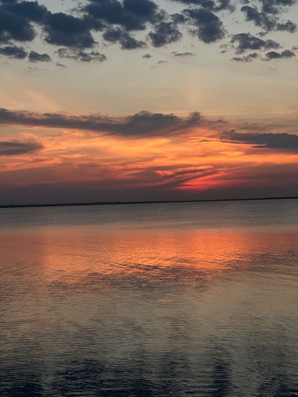Sunset at the lake, a giant alien, and bikes in Kokshetau