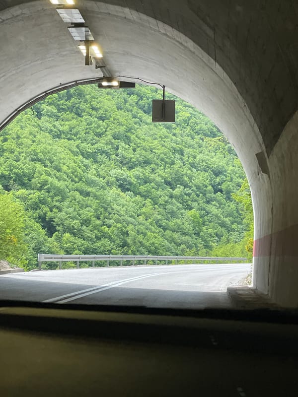 Tunnel view captured in Baljvine shows green hillside beyond