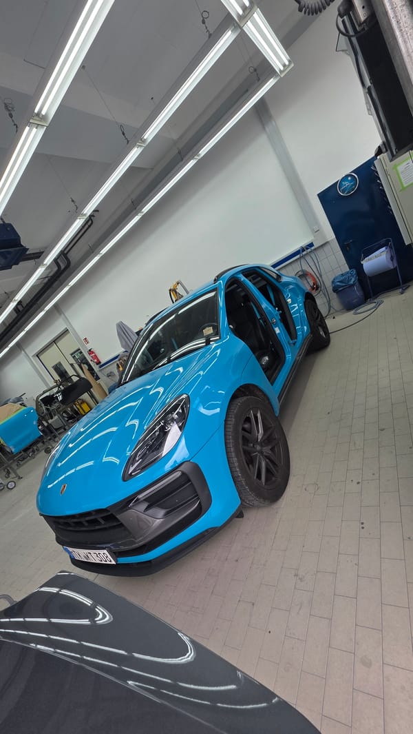 Cyan Porsche in the shop, plus a bike ride and street scenes