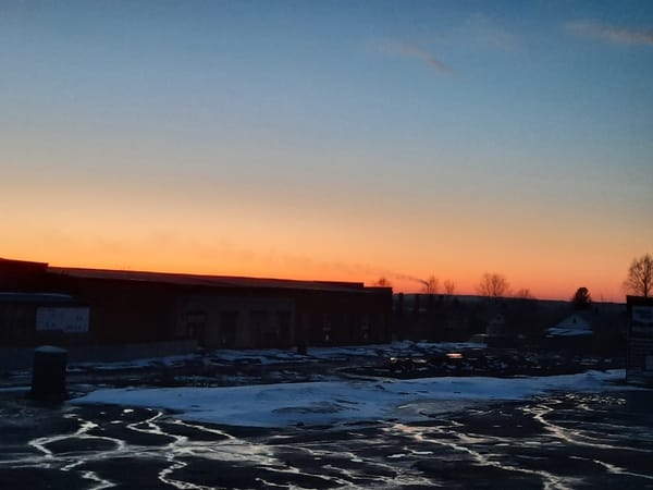 Spring twilight observed in Krasnogorskoye with snow patches remaining