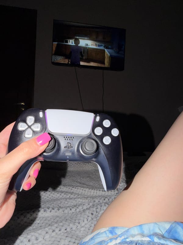 Rainy Tbilisi night, gaming indoors with a forest view