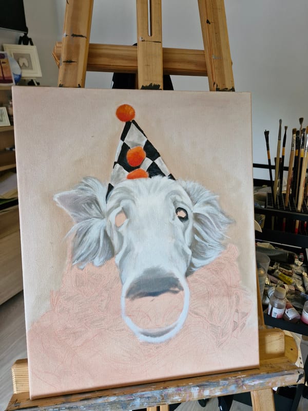 Artist studio captures dog portrait and urban paintings