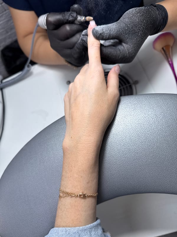 Woman documents Moscow nail salon visit and VDNKh sightseeing