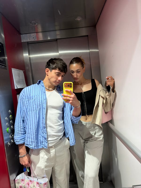 Couple Takes Mirror Selfie in Sofia Elevator