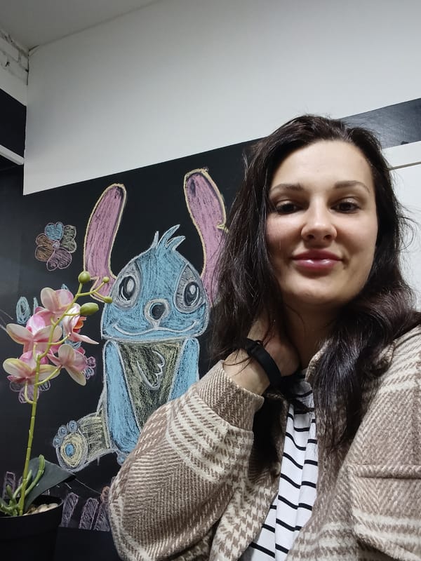 Woman takes selfies indoors in Birobidzhan, Russia