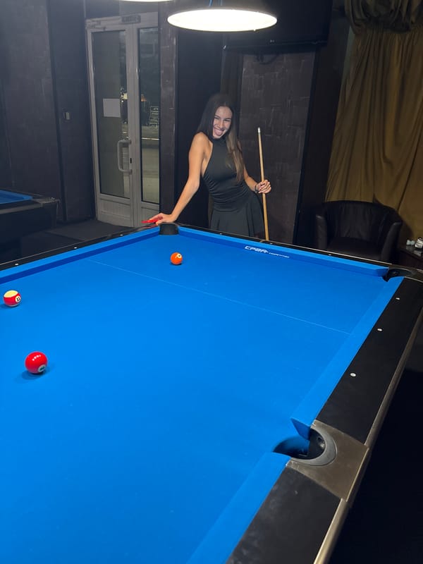Pool night at a dimly lit bar in Vratsa, Bulgaria.