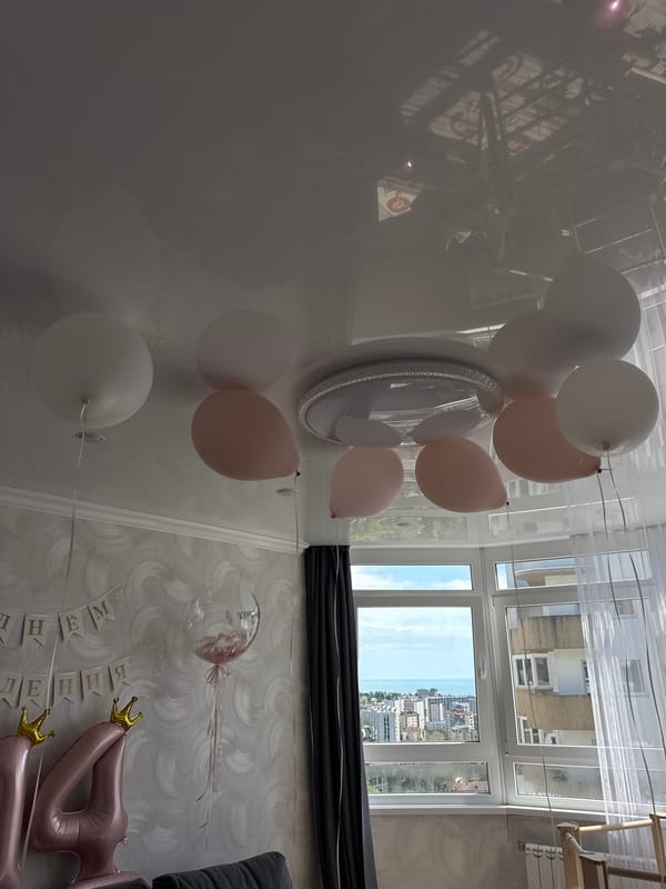 Couple celebrates with balloon decorations in Sochi apartment