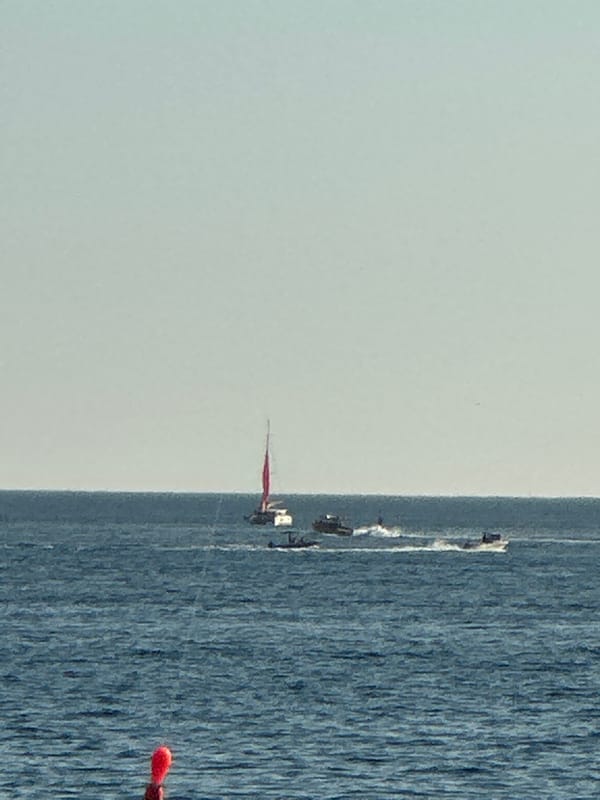 Sailboats, yachts, and parasailing on the Adriatic off Budva