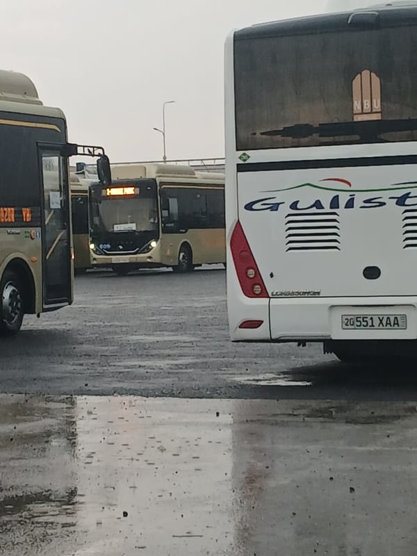Rain soaks Gulistan bus station on a June afternoon