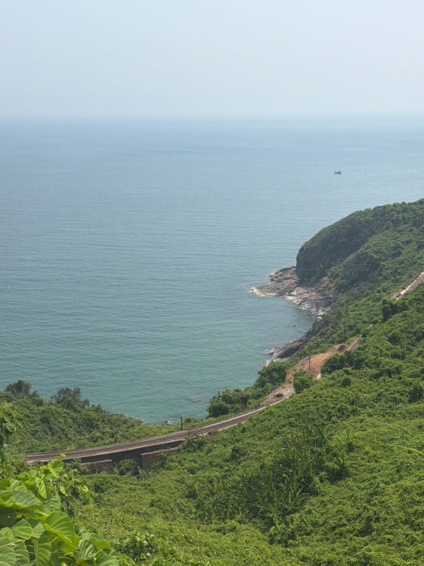 Coastal hillside with railway tracks observed near Huế, Vietnam