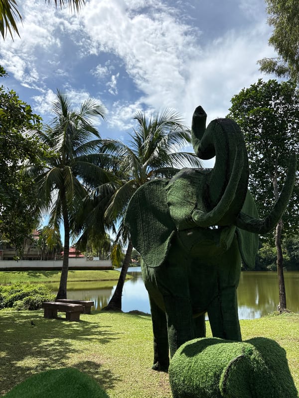 Elephant topiaries and a quiet lake in Choeng Thale park