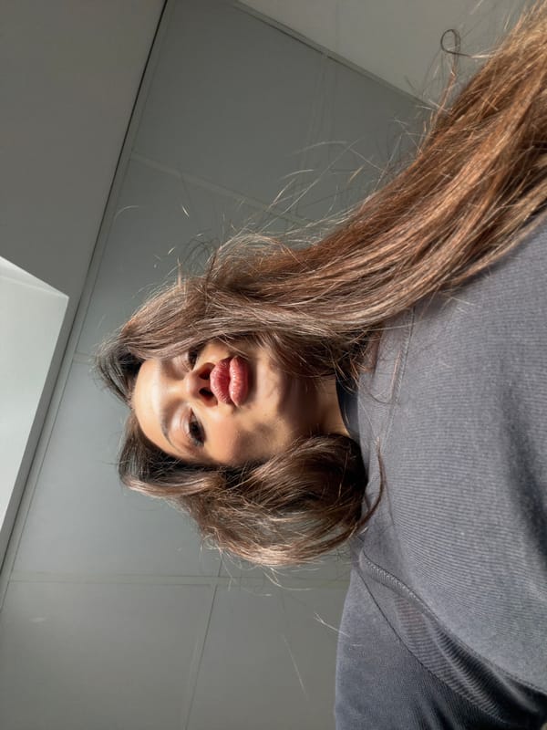 Woman takes selfies in Varna office space early morning