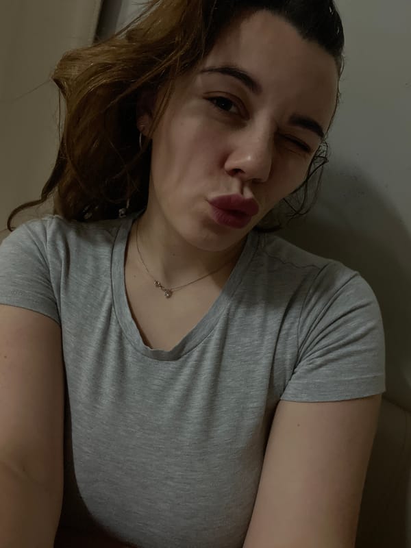 Woman takes casual selfies on sofa in Leninakan