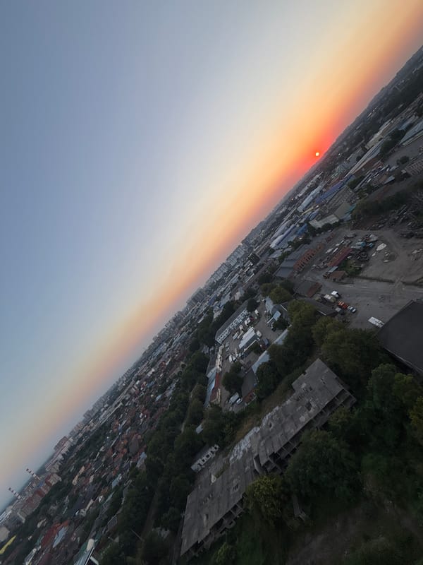 Krasnodar at sunset from above, sky ablaze with color.
