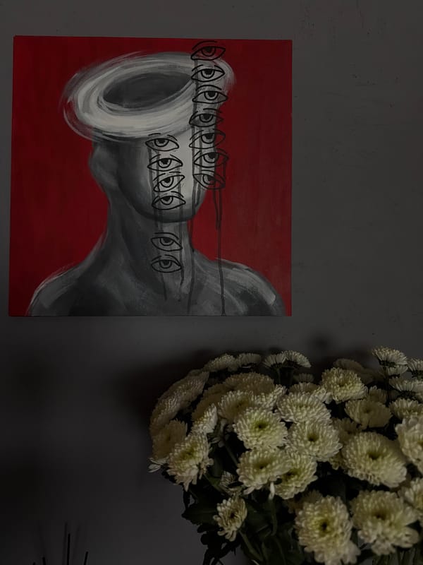 Abstract art display observed alongside flowers in Ust-Ilimsk