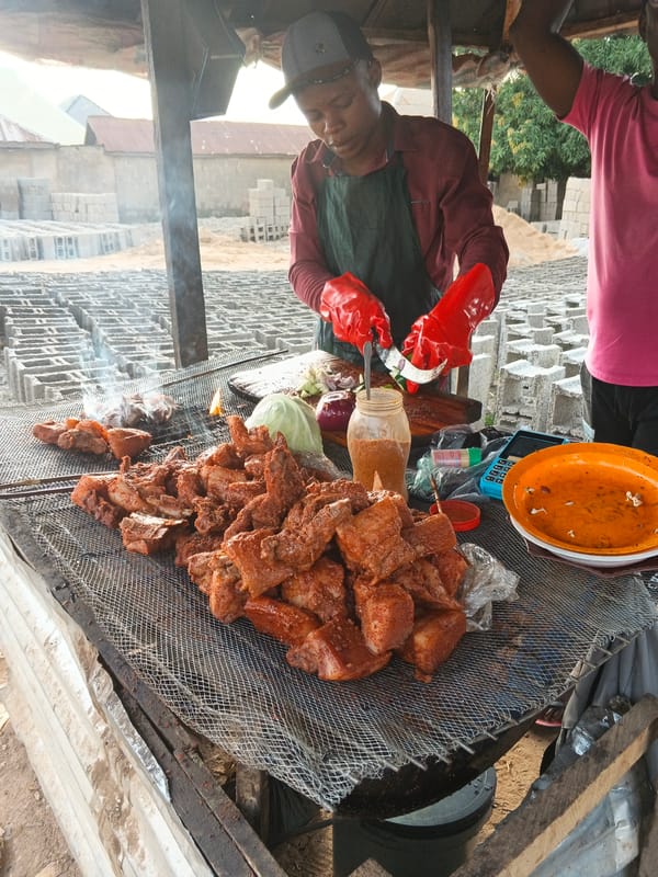 Daily life unfolds in Rido: street food, soccer games