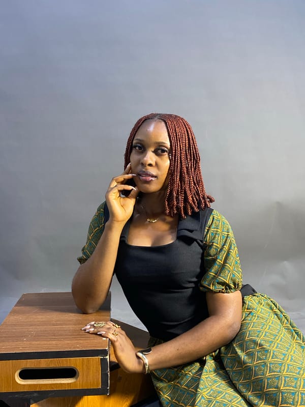 Woman poses for studio photograph in Jos, Nigeria