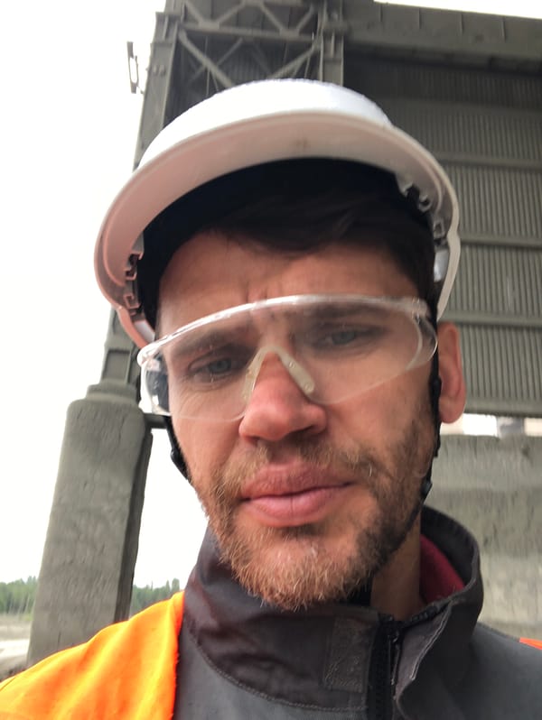 Safety gear close-up at a worksite in Slantsy, Russia.
