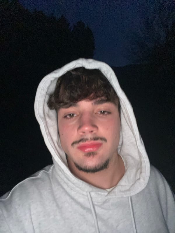 Two men document twilight walk through Portuguese mountains