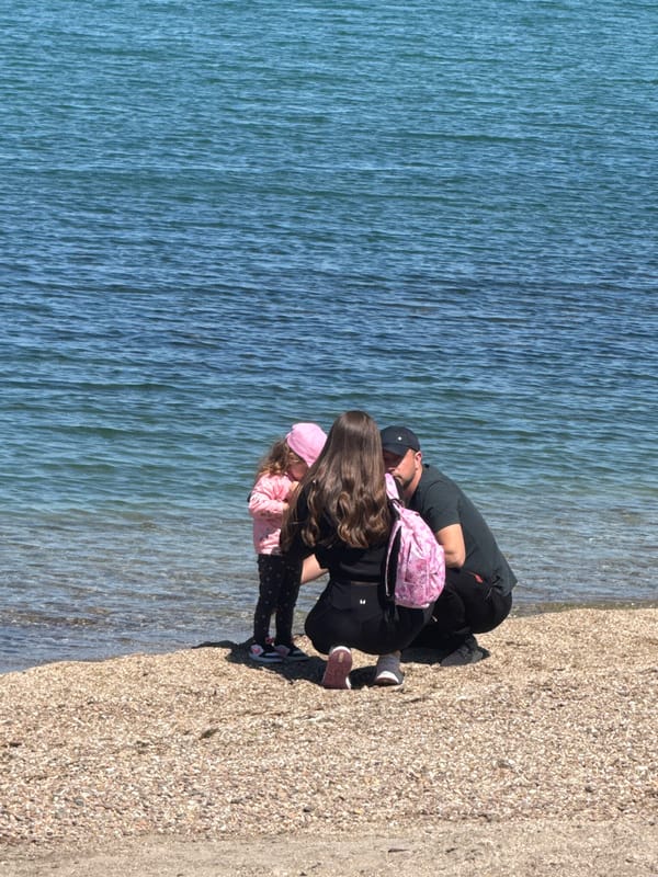 Family beach day with child playing at Burgas wakeboarding facility