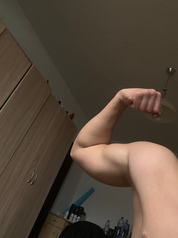 Young man's gym workout session documented in Zlatograd, Bulgaria