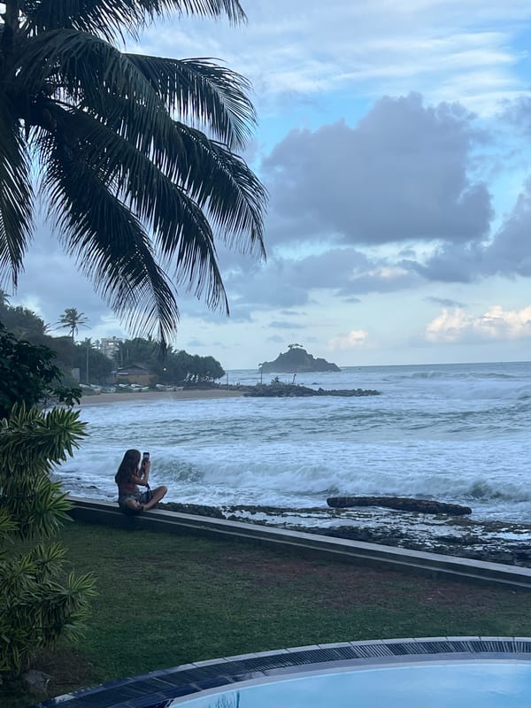 Stormy coastline and street life in Goviyapana, Sri Lanka