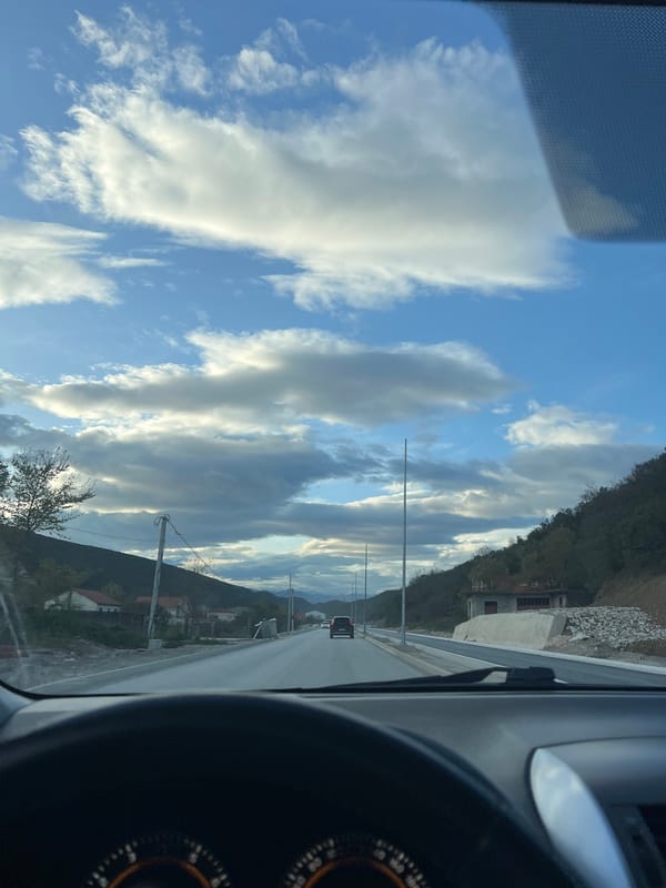 Driver captures industrial Montenegro landscape during brief afternoon journey