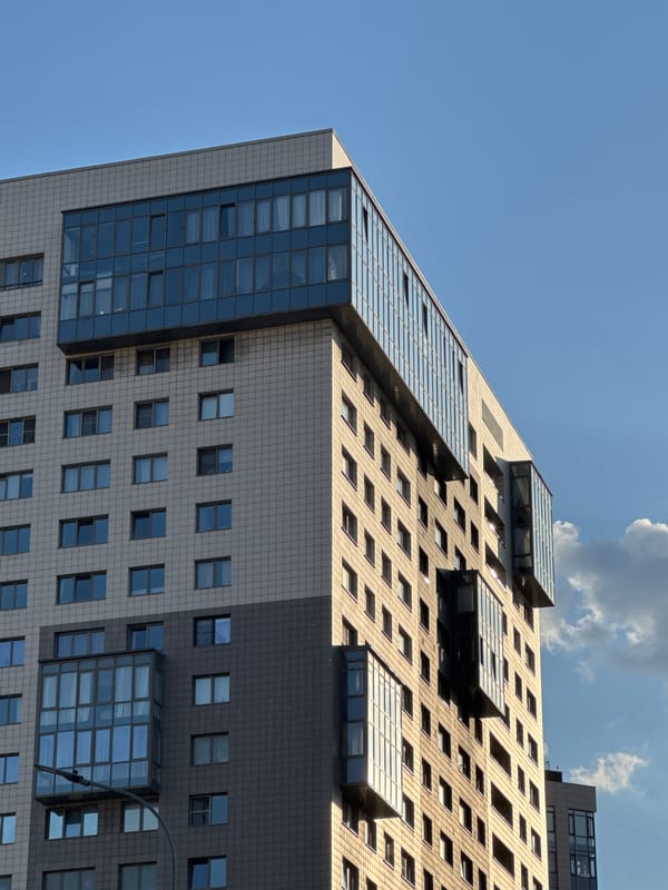 Modern geometric building photographed from multiple angles