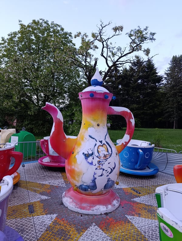 Sofia park scenes capture amusement rides and pond sculptures