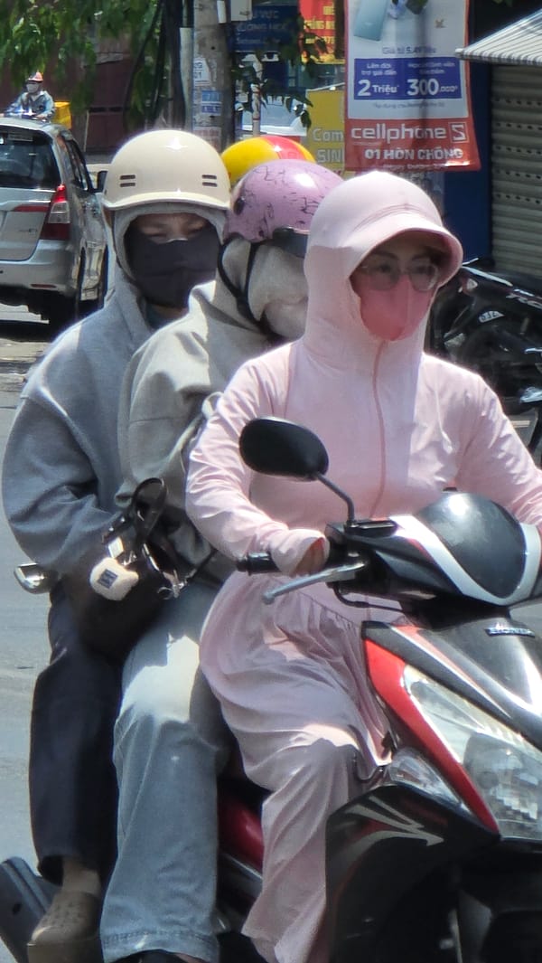 Early morning motorcycle traffic observed in Nha Trang streets