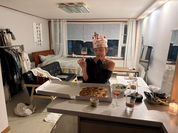 Woman wearing metallic crown observed in Seoul apartment