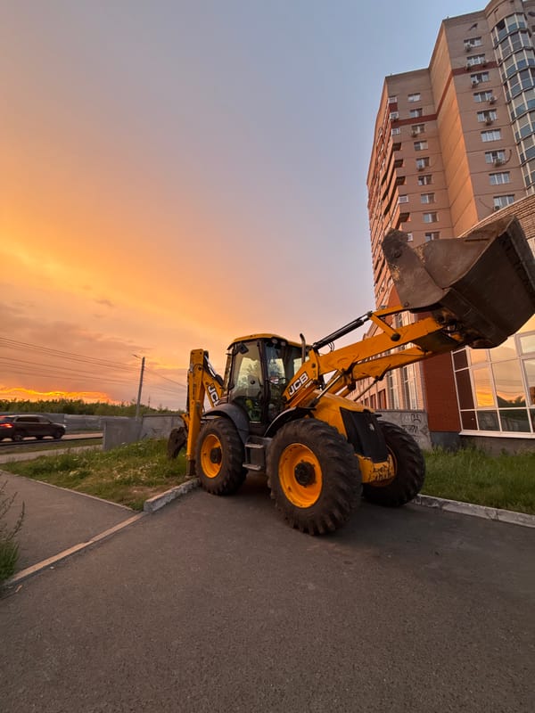 Izhevsk at golden hour: wildflowers, a rainbow, and city streets