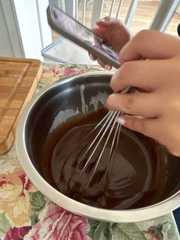 Baker prepares chocolate tarts in Varna kitchen