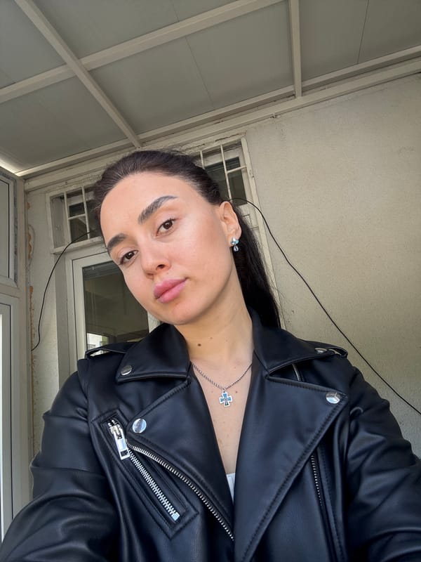 Woman photographed in multiple Tbilisi locations during morning hours