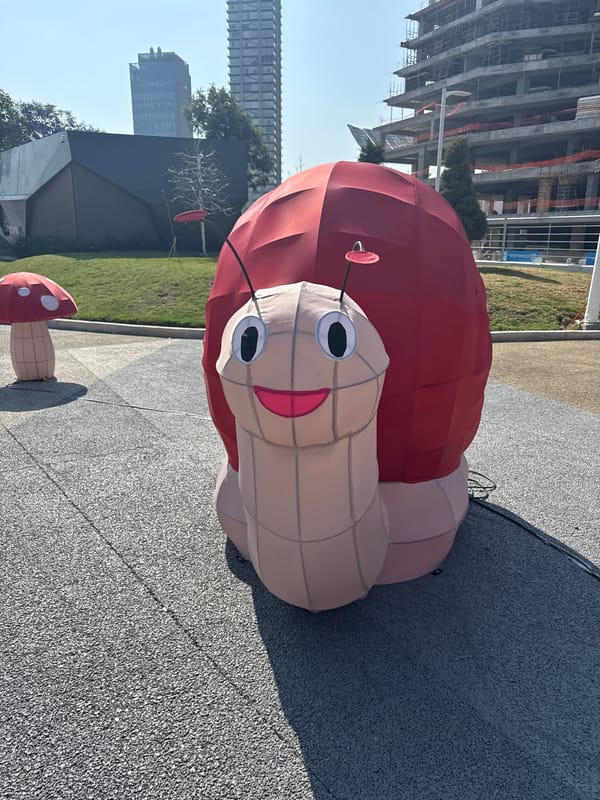 Whimsical animal sculptures displayed at Puebla park near Ferris wheel