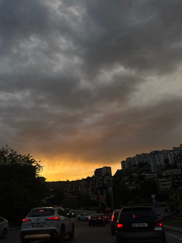 Dramatic divided sky observed over Tbilisi streets