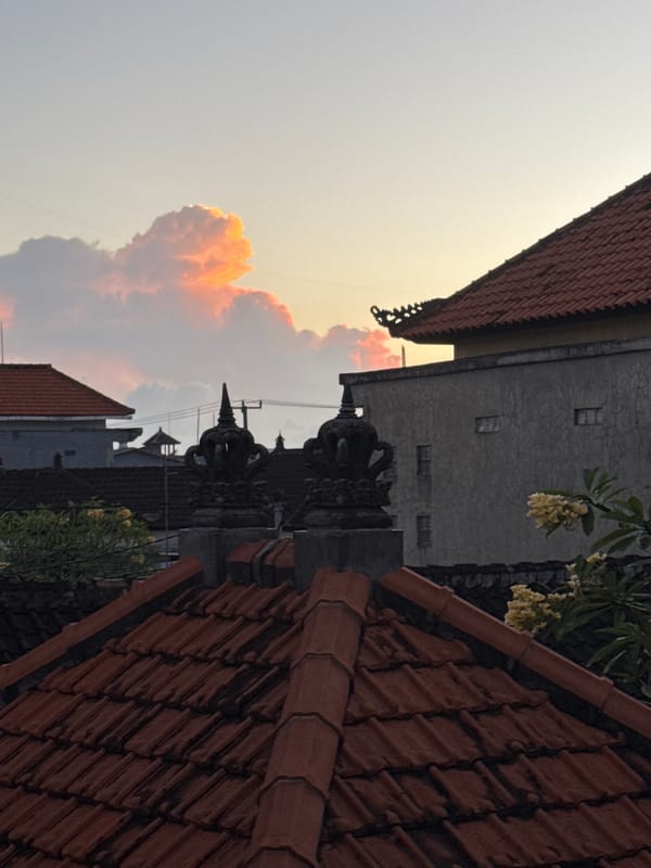 Sunset scene documented in Kuta, Indonesia with architectural views